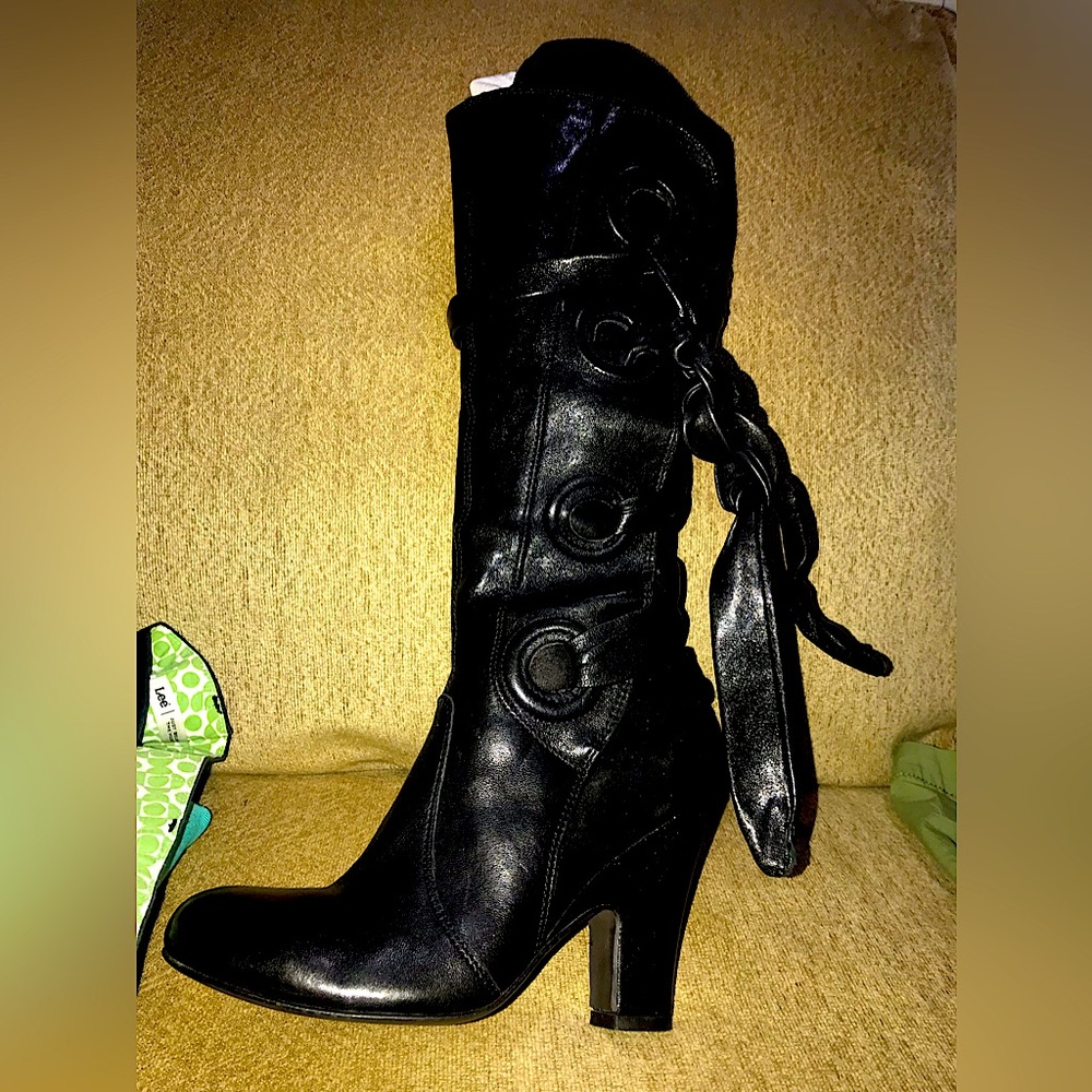 Near knee high black heeled designer buttery soft leather tall boots